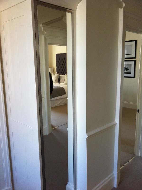 Full-length wardrobe mirror fitted in East Molesey home
